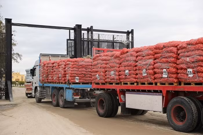 A truck with humanitarian aid enters Gaza from the Egyptian side of the Rafah border crossing, on Feb. 24, 2025. (Photo: Xinhua). Israel's decision to block humanitarian aid to Gaza since early Sunday has sparked fierce condemnation from Palestinian factions, regional countries, and international organizations.