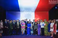 Diplomats and representatives of agencies and organisations pose for a group photo at the reception marking the 237th anniversary of the French National Day.