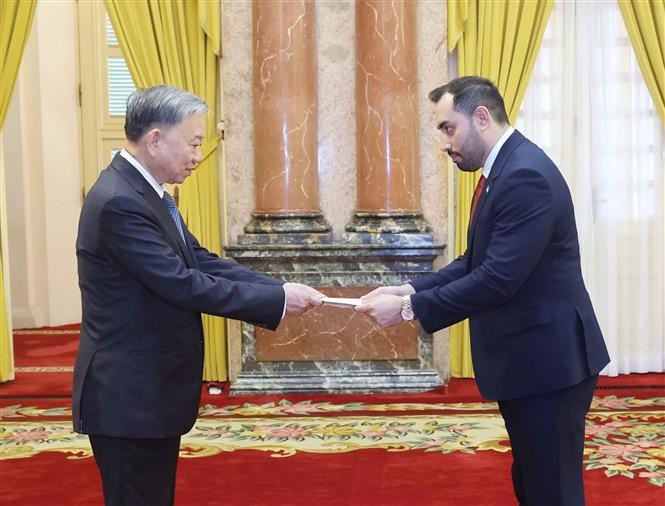 President To Lam (L) and Nicaraguan Ambassador Mario Jose Armengol Campos at the event in Hanoi on June 21. (Photo: VNA)