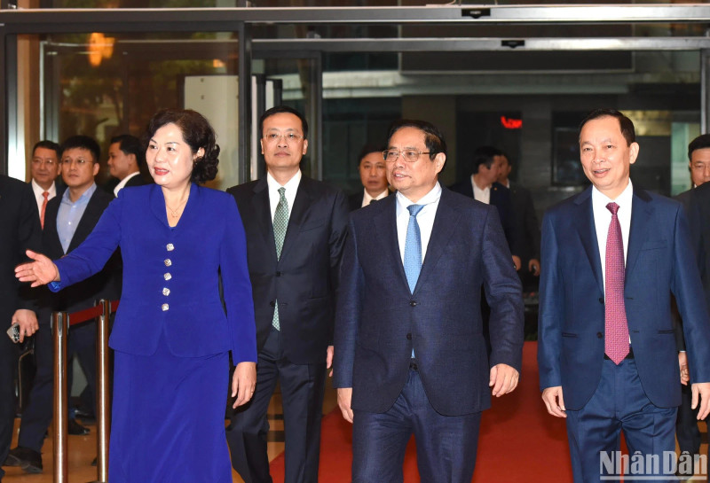 Prime Minister Pham Minh Chinh is present at the conference.
