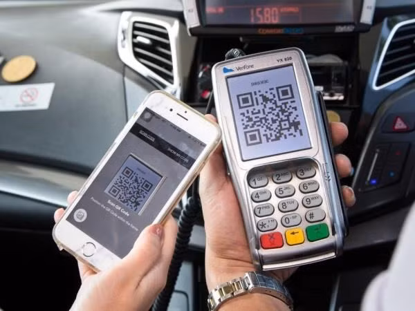 Payment with QR code scanning is secure. (Photo: VietnamPlus)