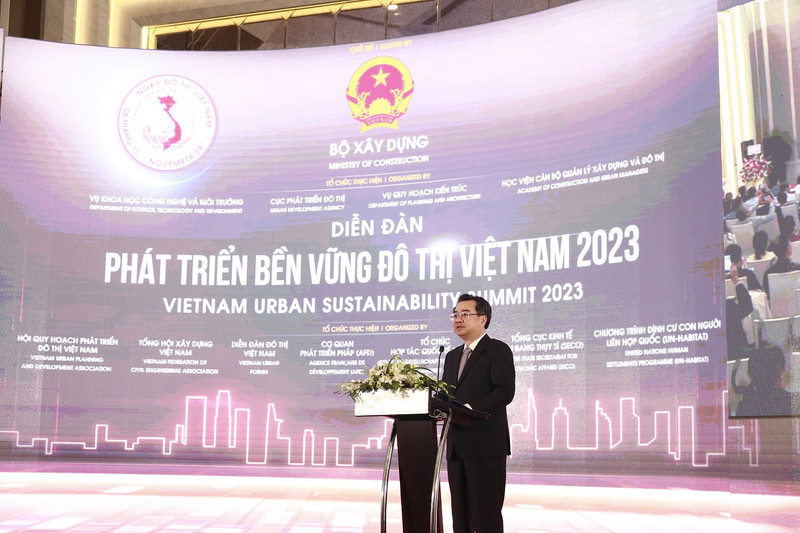 Minister of Construction Nguyen Thanh Nghi speaking at the event. (Photo: NDO)