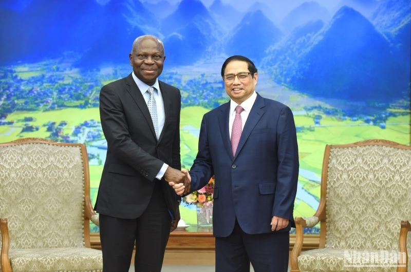 Prime Minister Pham Minh Chinh and Director-General of the International Labour Organisation (ILO) Gilbert F. Houngbo (Photo: TRAN HAI/NDO)