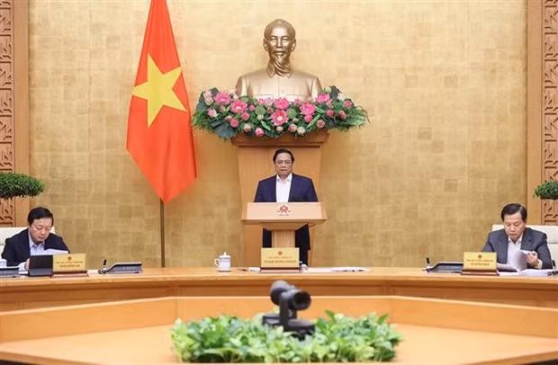 PM Pham Minh Chinh addresses the Government’s regular meeting for November in Hanoi on December 6. (Photo: VNA)
