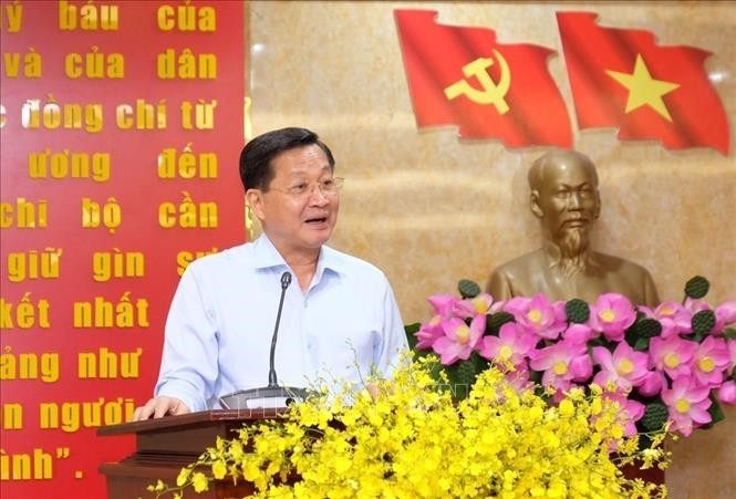 Deputy Prime Minister Le Minh Khai speaking at the working session (Photo: VNA)