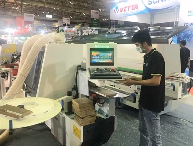 A booth at the 2022 Vietnam International Woodworking Industry Fair. This year's expo will be held in Ho Chi Minh from September 20 to 23. (Photo: VNA)