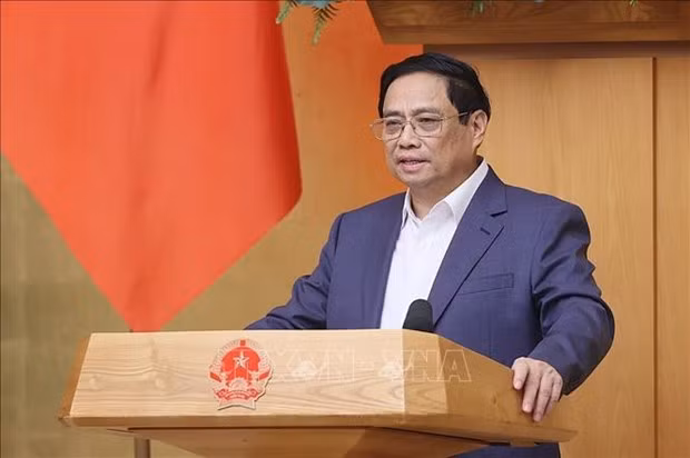 Prime Minister Pham Minh Chinh addresses the meeting (Photo: VNA)