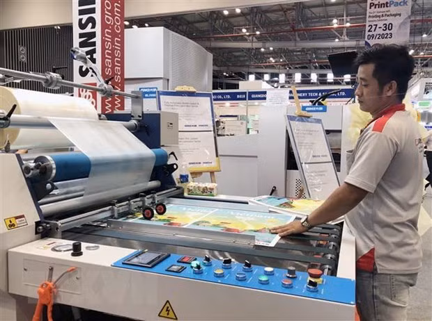 Latest technologies in the printing industry are introduced at the event. (Photo: VNA)