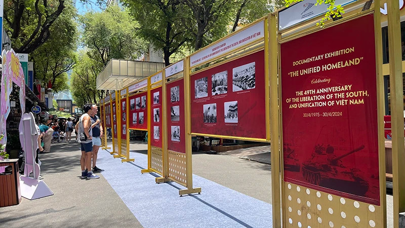 Foreign tourists visit the exhibition at Book Street in Ho Chi Minh City.