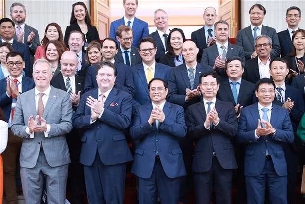PM Pham Minh Chinh and leaders of US companies. (Photo: VNA)