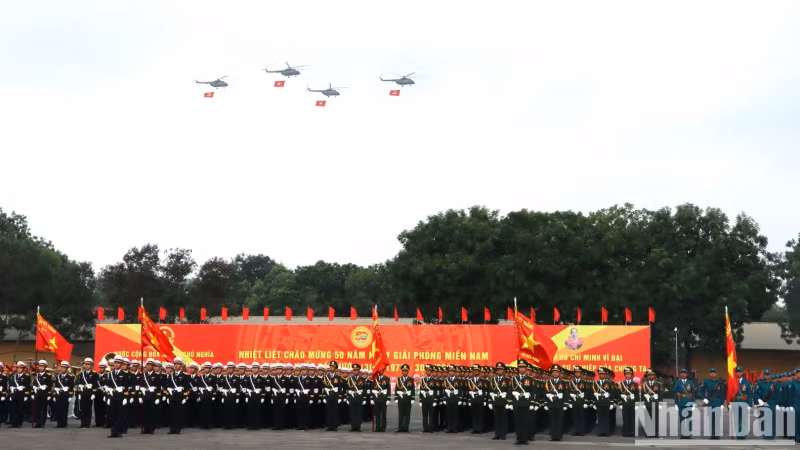 Air Force units fly overhead carrying the Party and National Flags to open the rehearsal.