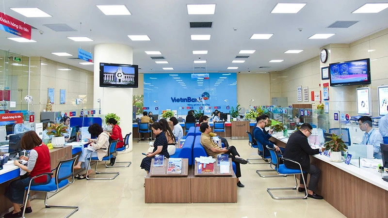 Customers transact at a VietinBank branch