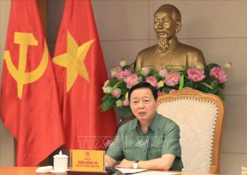 Deputy Prime Minister Tran Hong Ha speaks at the meeting. (Photo: VNA)