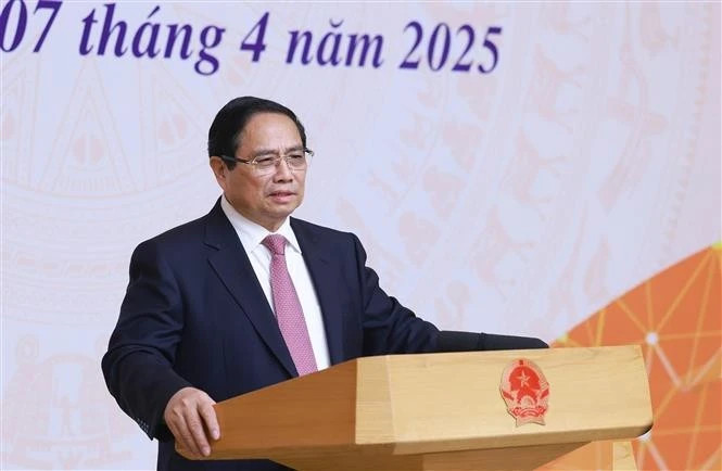 Prime Minister Pham Minh Chinh speaks at the meeting. (Photo: VNA)