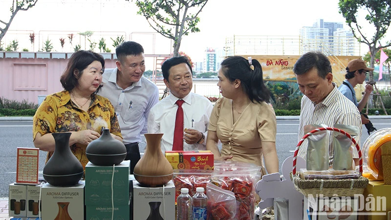Delegates visit booths of cooperative products.