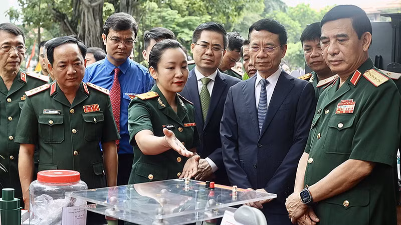 Delegates visit the creative products display area.