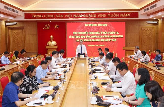 Chairman of the Commission for Information and Education Nguyen Trong Nghia speaks at the event (Photo: VNA)