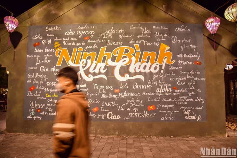 Visitors can check in with the Ninh Binh greeting wall in many languages.