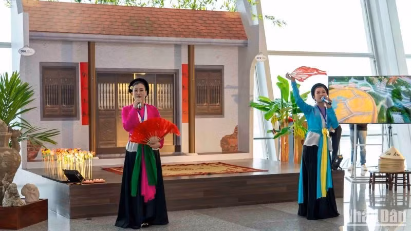 Artists performing Cheo singing at the "Flavours of Hanoi" Cultural Week.