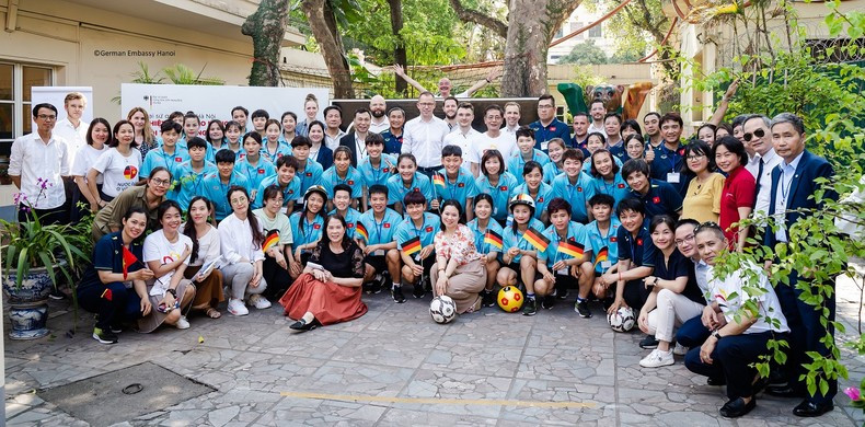 Delegates pose for a group photo at the event 
