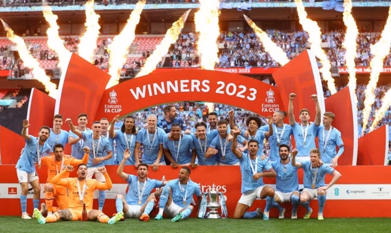 Manchester City players celebrate with the trophy after winning the FA Cup - FA Cup Final - Manchester City v Manchester United - Wembley Stadium, London, the UK - June 3, 2023. (Photo: Reuters)