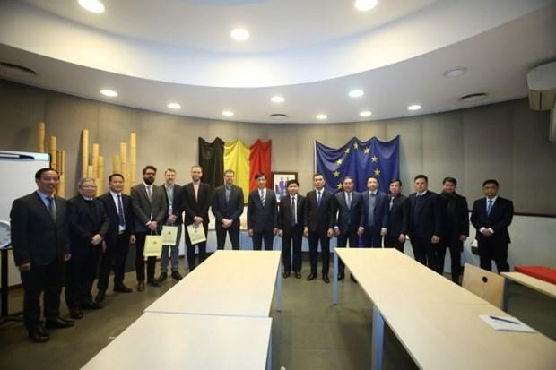 At the working session (Photo: VNA)