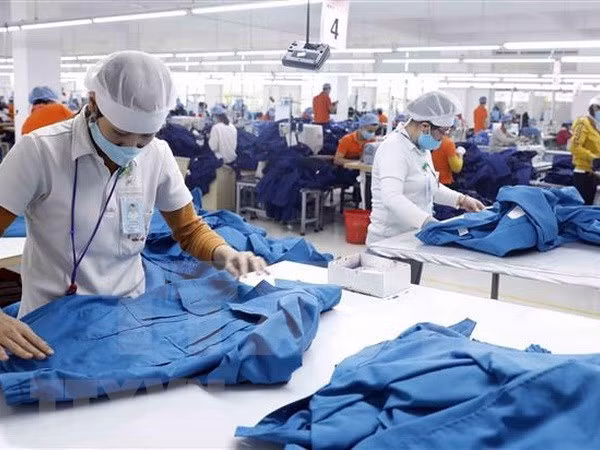 Canadian enterprises are very interested in the supply of goods from Vietnam. (Photo: VNA)