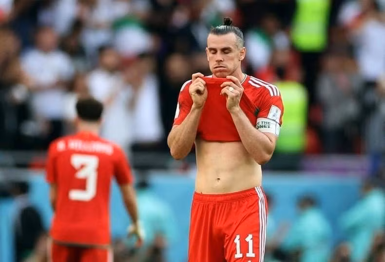 Wales' Gareth Bale looks dejected after Iran's second goal. REUTERS/Carl Recine