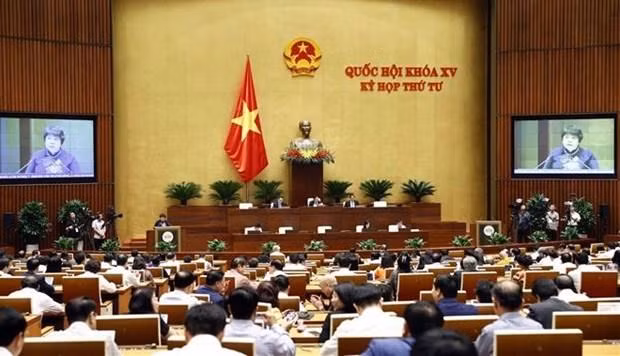 NA deputies discuss draft Law on Medical Examination and Treatment (amended). (Photo: VNA)