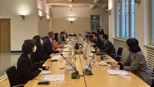 At the working session (Photo: VNA)