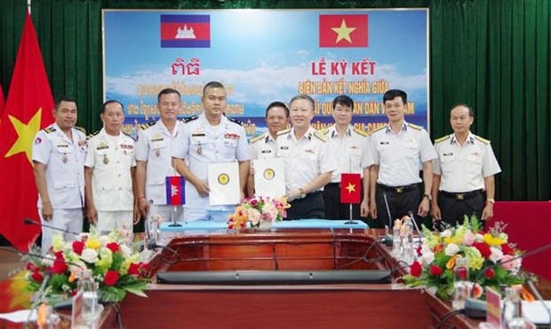 At the signing ceremony (Photo: VNA) 