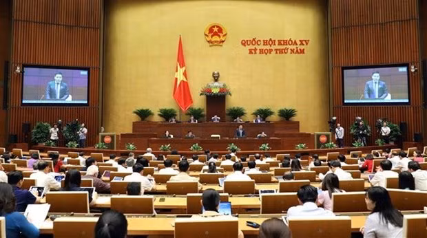 A discussion at the NA fifth session (Photo: VNA)