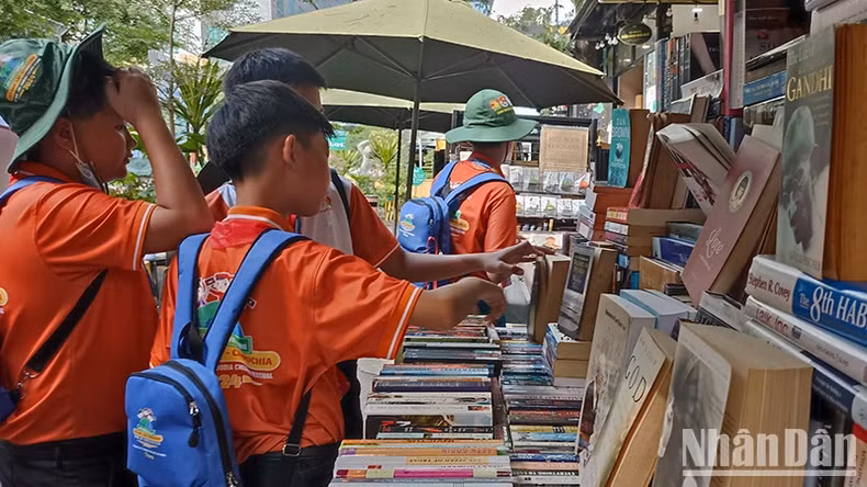 Children visit book stalls at Ho Chi Minh City Book Street.