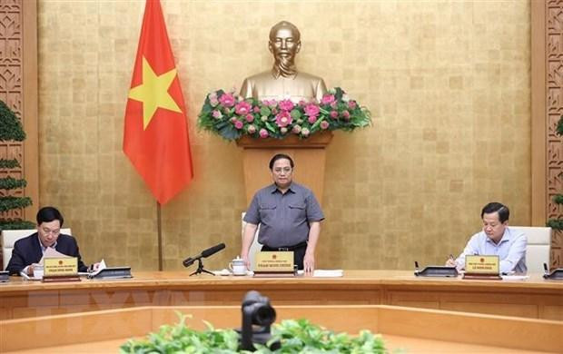 Prime Minister Pham Minh Chinh speaking at the meeting. (Photo: VNA)