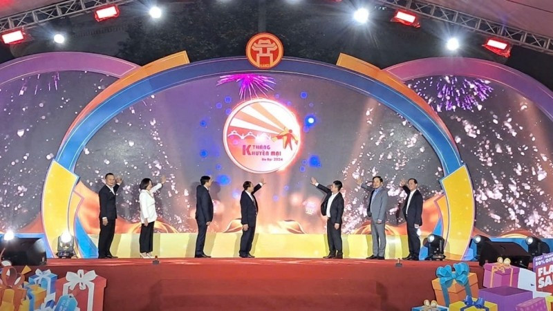 Photo 1: Delegates perform the opening ceremony of the programme.
