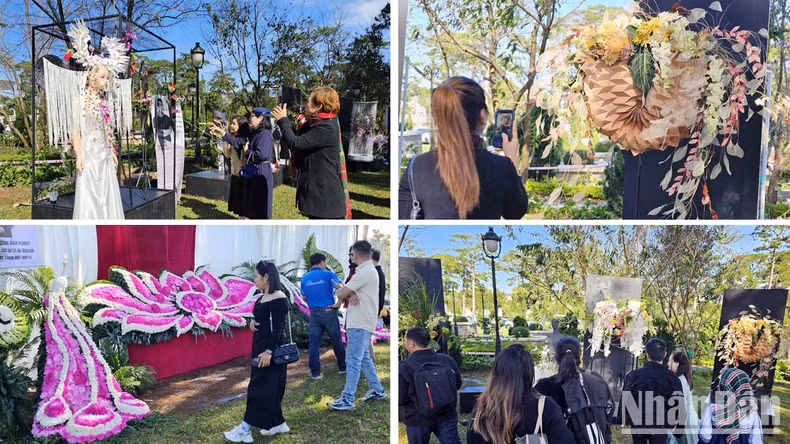 Fresh flower art works at the exhibition space attract viewers. Fresh flower art works at the exhibition space attract viewers.