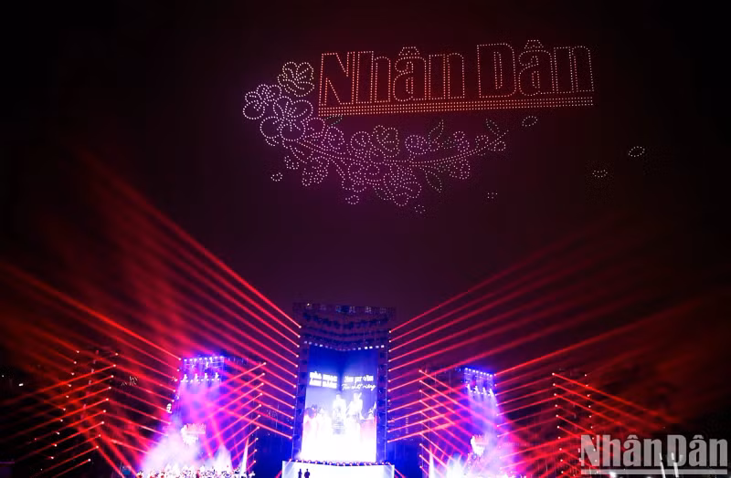 The logo of Nhan Dan Newspaper shines brightly.
