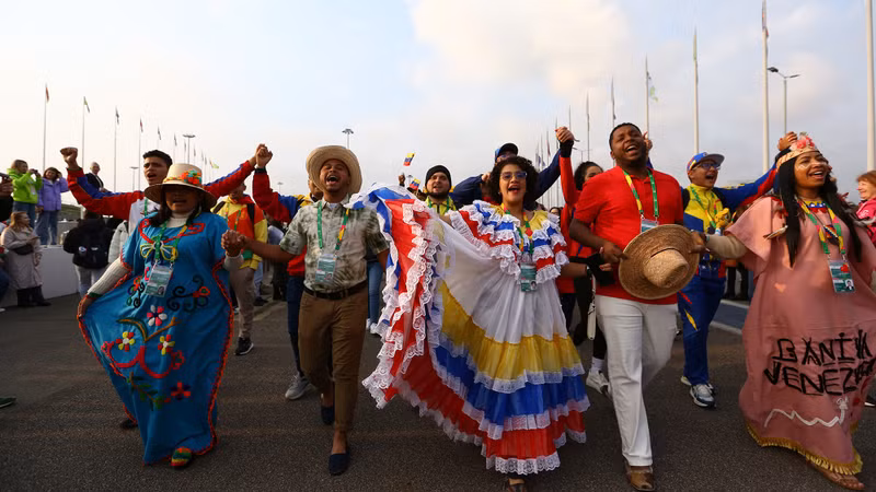 The Vietnamese delegates join more than 20,000 others from all over the world in a mass parade at Sirius Olympic Park on March 4.