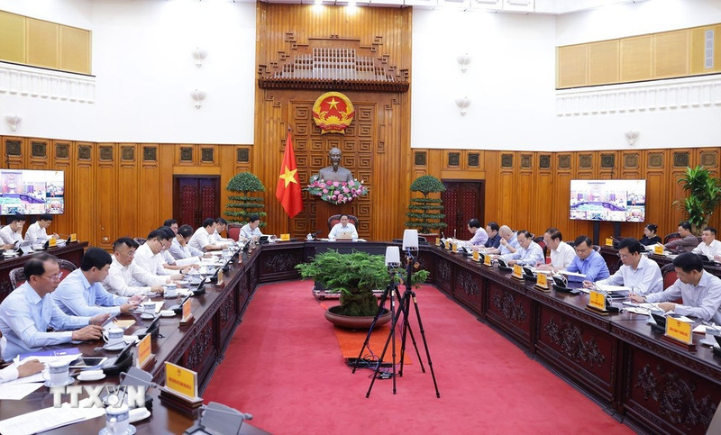 PM Pham Minh Chinh chairs a meeting with ministries, sectors and localities on power supply in 2024. (Photo: VNA)