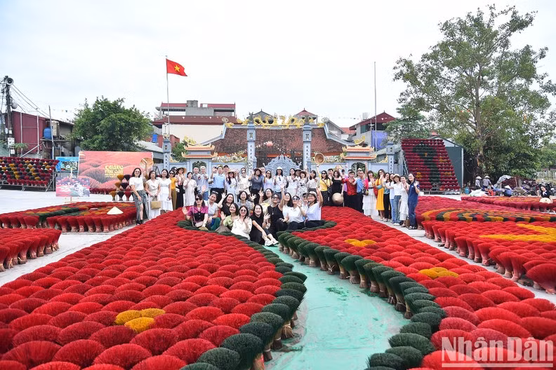 Visitors at the Quang Phu Cau incense-making village in Ung Hoa District, Hanoi 