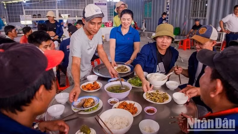 The workers' enthusiasm is fuelled by delicious meals provided by devoted construction cooks.