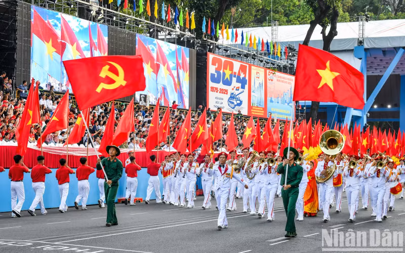 The parade takes place along Le Duan street in District 1
