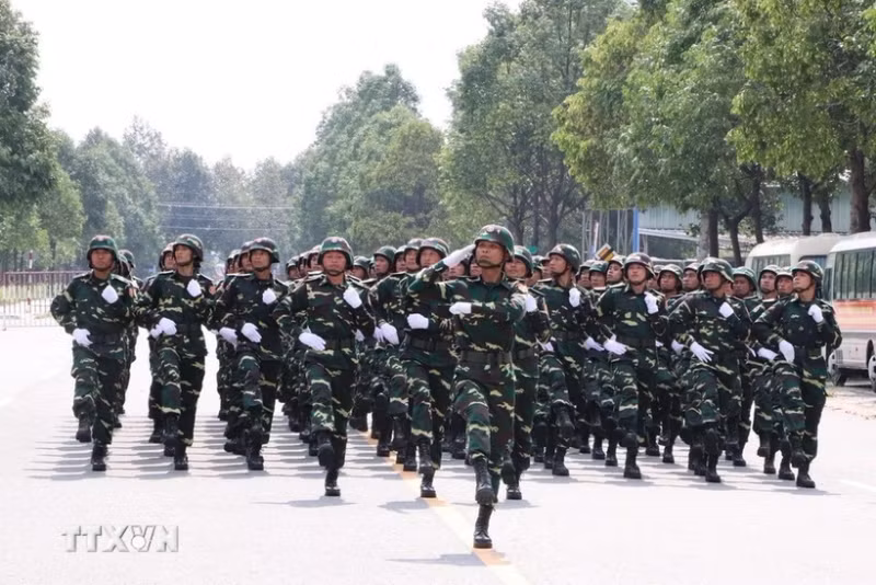 Soldiers from the Lao People’s Army in a rehearsal (Photo: VNA)