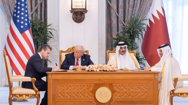 Qatari Emir Sheikh Tamim bin Hamad Al Thani (2nd R) and US President Donald Trump (2nd L) witness the signing of a series of deals at the Amiri Diwan in Doha, Qatar, on May 14, 2025. (Amiri Diwan/Qatar News Agency/Handout via Xinhua)