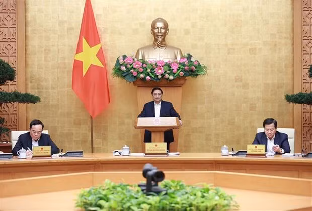 Prime Minister Pham Minh Chinh speaks at the meeting. (Photo: VNA)