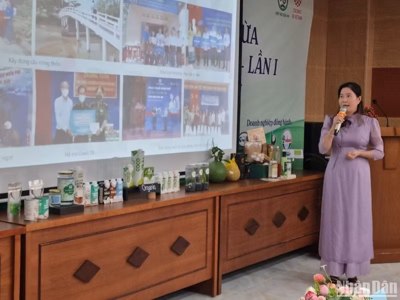 A representative of a business introduces products made from coconut.