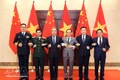 Vietnamese and Chinese ministers pose for a photo at the first ministerial-level Strategic Dialogue among their foreign affairs, defence and public security ministries. (Photo: VNA)