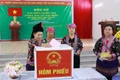 Voters in Nam Sao 2 village, Pa Tan commune of Lai Chau cast their ballots on March 15 (Photo: VNA)