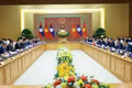 Prime Minister Le Minh Hung and his visiting Lao counterpart Sonexay Siphandone have talks in Ha Noi on June 7 (Photo: VNA)