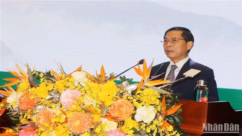 Deputy Prime Minister and Minister of Foreign Affairs Bui Thanh Son speaks at the opening ceremony for the symposium.